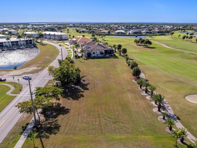 Spanning more than a quarter acre and overlooking the pristine on Saint Andrews South Golf Club in Florida - for sale on GolfHomes.com, golf home, golf lot
