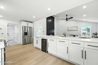 This fully renovated 4-bedroom, 2-bath home blends modern on Jacksonville Beach Golf Course in Florida - for sale on GolfHomes.com, golf home, golf lot