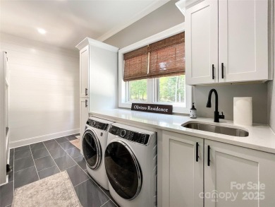 Discover this stunning custom-built farmhouse nestled on 3.27 on Eagle Chase Golf Club in North Carolina - for sale on GolfHomes.com, golf home, golf lot