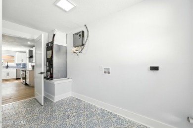 This fully renovated 4-bedroom, 2-bath home blends modern on Jacksonville Beach Golf Course in Florida - for sale on GolfHomes.com, golf home, golf lot