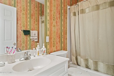 This first-floor Golfmaster II villa is the perfect blend of on Long Cove Club in South Carolina - for sale on GolfHomes.com, golf home, golf lot