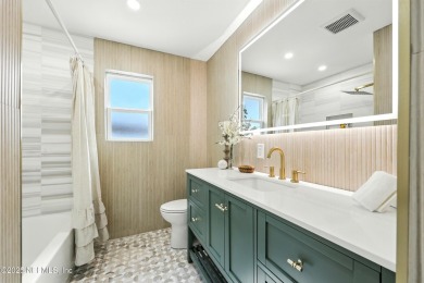 This fully renovated 4-bedroom, 2-bath home blends modern on Jacksonville Beach Golf Course in Florida - for sale on GolfHomes.com, golf home, golf lot