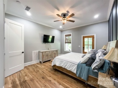 Discover this stunning custom-built farmhouse nestled on 3.27 on Eagle Chase Golf Club in North Carolina - for sale on GolfHomes.com, golf home, golf lot