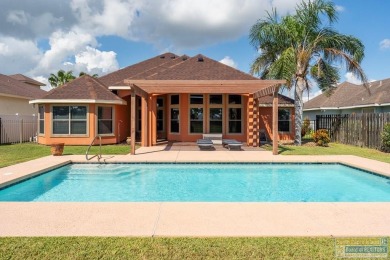 Welcome to coastal living at its finest! Custom built in 2006 by on South Padre Island Golf Club in Texas - for sale on GolfHomes.com, golf home, golf lot