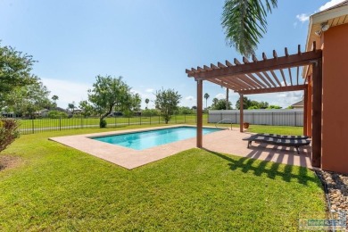Welcome to coastal living at its finest! Custom built in 2006 by on South Padre Island Golf Club in Texas - for sale on GolfHomes.com, golf home, golf lot