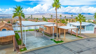 Premium Double-Lot Retreat With Full Renovation, RV Design & on Riverview Golf Course in Arizona - for sale on GolfHomes.com, golf home, golf lot