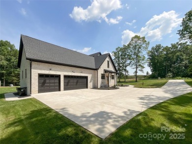 Discover this stunning custom-built farmhouse nestled on 3.27 on Eagle Chase Golf Club in North Carolina - for sale on GolfHomes.com, golf home, golf lot
