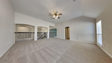 Beautiful home with expansive vaulted ceilings and luxury vinyl on WestRidge Golf Course in Texas - for sale on GolfHomes.com, golf home, golf lot