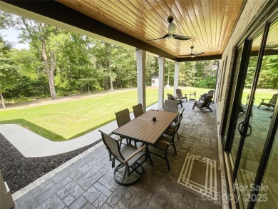 Discover this stunning custom-built farmhouse nestled on 3.27 on Eagle Chase Golf Club in North Carolina - for sale on GolfHomes.com, golf home, golf lot