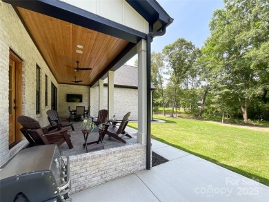 Discover this stunning custom-built farmhouse nestled on 3.27 on Eagle Chase Golf Club in North Carolina - for sale on GolfHomes.com, golf home, golf lot