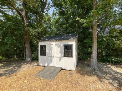 Discover this stunning custom-built farmhouse nestled on 3.27 on Eagle Chase Golf Club in North Carolina - for sale on GolfHomes.com, golf home, golf lot