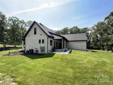 Discover this stunning custom-built farmhouse nestled on 3.27 on Eagle Chase Golf Club in North Carolina - for sale on GolfHomes.com, golf home, golf lot