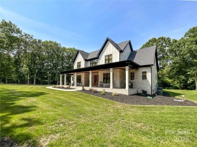 Discover this stunning custom-built farmhouse nestled on 3.27 on Eagle Chase Golf Club in North Carolina - for sale on GolfHomes.com, golf home, golf lot
