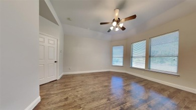 Beautiful home with expansive vaulted ceilings and luxury vinyl on WestRidge Golf Course in Texas - for sale on GolfHomes.com, golf home, golf lot