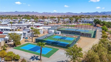 Premium Double-Lot Retreat With Full Renovation, RV Design & on Riverview Golf Course in Arizona - for sale on GolfHomes.com, golf home, golf lot