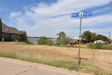 Build your dream house on a lot with beautiful views of the lake on Stewart Peninsula Golf Course in Texas - for sale on GolfHomes.com, golf home, golf lot