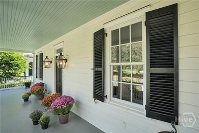 A captivating Lowcountry cottage in The Ford Field & River Club on The Ford Field and River Club  in Georgia - for sale on GolfHomes.com, golf home, golf lot