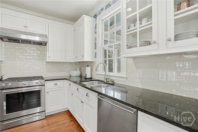 A captivating Lowcountry cottage in The Ford Field & River Club on The Ford Field and River Club  in Georgia - for sale on GolfHomes.com, golf home, golf lot