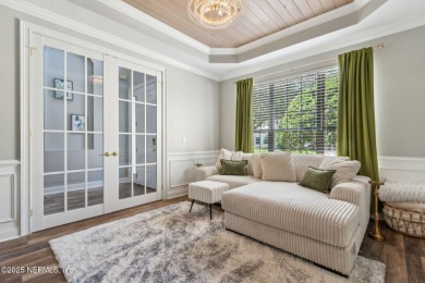 This exquisite 3 story brick-front Tudor spans nearly 4,000 sq on Eagle Landing Golf Club in Florida - for sale on GolfHomes.com, golf home, golf lot