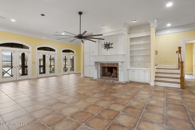 Experience waterfront living at its finest in Lake Caroline with on Lake Caroline Golf Club in Mississippi - for sale on GolfHomes.com, golf home, golf lot