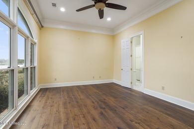 Experience waterfront living at its finest in Lake Caroline with on Lake Caroline Golf Club in Mississippi - for sale on GolfHomes.com, golf home, golf lot