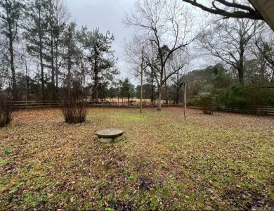 This spacious and charming 4 Bedroom 2 Bath home sits on just on Camden Country Club in Arkansas - for sale on GolfHomes.com, golf home, golf lot