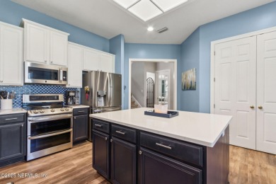 This exquisite 3 story brick-front Tudor spans nearly 4,000 sq on Eagle Landing Golf Club in Florida - for sale on GolfHomes.com, golf home, golf lot