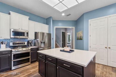 This exquisite 3 story brick-front Tudor spans nearly 4,000 sq on Eagle Landing Golf Club in Florida - for sale on GolfHomes.com, golf home, golf lot