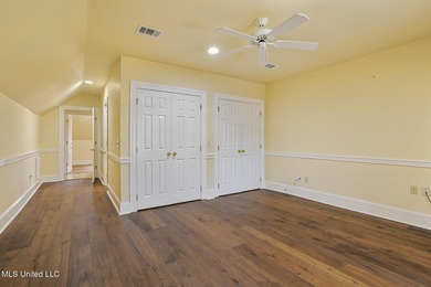 Experience waterfront living at its finest in Lake Caroline with on Lake Caroline Golf Club in Mississippi - for sale on GolfHomes.com, golf home, golf lot