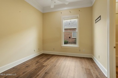 Experience waterfront living at its finest in Lake Caroline with on Lake Caroline Golf Club in Mississippi - for sale on GolfHomes.com, golf home, golf lot