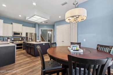 This exquisite 3 story brick-front Tudor spans nearly 4,000 sq on Eagle Landing Golf Club in Florida - for sale on GolfHomes.com, golf home, golf lot
