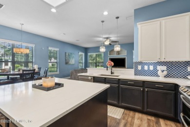 This exquisite 3 story brick-front Tudor spans nearly 4,000 sq on Eagle Landing Golf Club in Florida - for sale on GolfHomes.com, golf home, golf lot