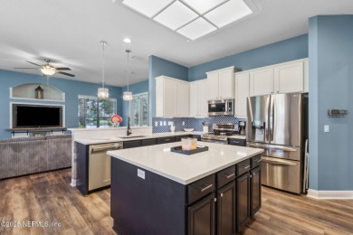 This exquisite 3 story brick-front Tudor spans nearly 4,000 sq on Eagle Landing Golf Club in Florida - for sale on GolfHomes.com, golf home, golf lot