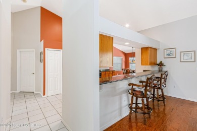 Discover the perfect blend of comfort  privacy in this on Baytree National Golf Links in Florida - for sale on GolfHomes.com, golf home, golf lot