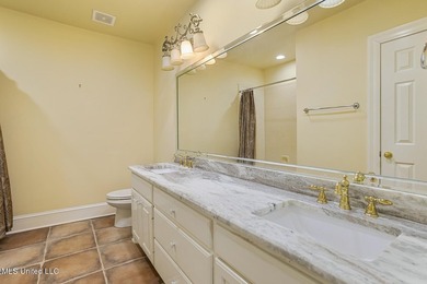 Experience waterfront living at its finest in Lake Caroline with on Lake Caroline Golf Club in Mississippi - for sale on GolfHomes.com, golf home, golf lot