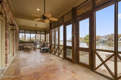 Experience waterfront living at its finest in Lake Caroline with on Lake Caroline Golf Club in Mississippi - for sale on GolfHomes.com, golf home, golf lot