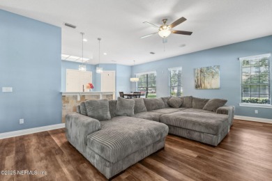 This exquisite 3 story brick-front Tudor spans nearly 4,000 sq on Eagle Landing Golf Club in Florida - for sale on GolfHomes.com, golf home, golf lot