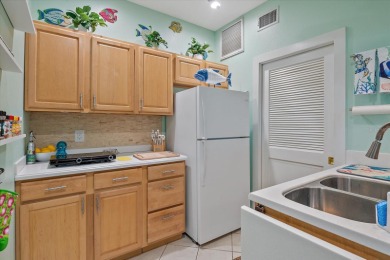 Two homes for the price of one!  This charming Venice retreat on Jacaranda West Country Club in Florida - for sale on GolfHomes.com, golf home, golf lot