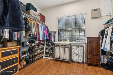 This exquisite 3 story brick-front Tudor spans nearly 4,000 sq on Eagle Landing Golf Club in Florida - for sale on GolfHomes.com, golf home, golf lot