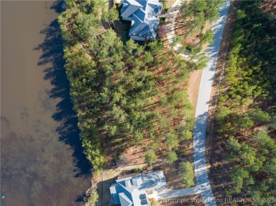 Beautiful waterfront and golf course view lot located in on Anderson Creek Golf Club in North Carolina - for sale on GolfHomes.com, golf home, golf lot