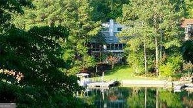 Spacious Contemporary Lake Front Home with Big Water Views and on The Highlands Course at Lake Arrowhead in Georgia - for sale on GolfHomes.com, golf home, golf lot