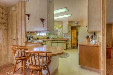 Welcome to Kelly Ridge! This spacious 1980 MH has a 433A on Lake Oroville Golf and Event Center in California - for sale on GolfHomes.com, golf home, golf lot