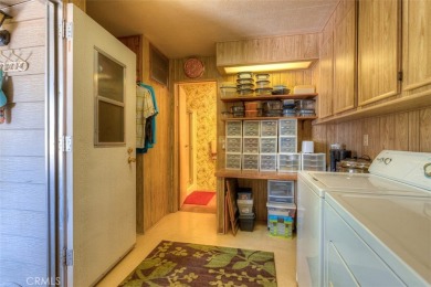 Welcome to Kelly Ridge! This spacious 1980 MH has a 433A on Lake Oroville Golf and Event Center in California - for sale on GolfHomes.com, golf home, golf lot