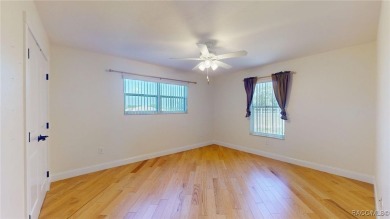 Welcome to this beautifully maintained 3-bedroom, 3-bath home on Citrus Hills Golf Club in Florida - for sale on GolfHomes.com, golf home, golf lot