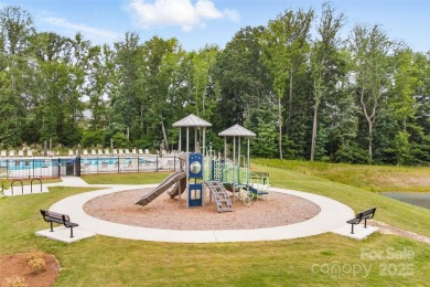 Nestled in the desirable Windhaven, a 55+ community, in Tega Cay on Tega Cay Golf Club in South Carolina - for sale on GolfHomes.com, golf home, golf lot