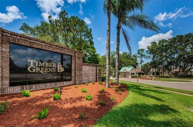THIS UNIQUE VILLA IS ON A CORNER LOT & CUL-DE-SAC WITH A POND on Timber Greens Country Club in Florida - for sale on GolfHomes.com, golf home, golf lot