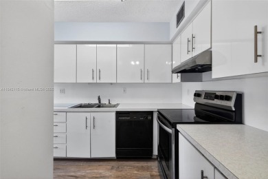 Wonderful 1st floor corner unit with parking right in front for on Villa Del Ray Golf Club in Florida - for sale on GolfHomes.com, golf home, golf lot