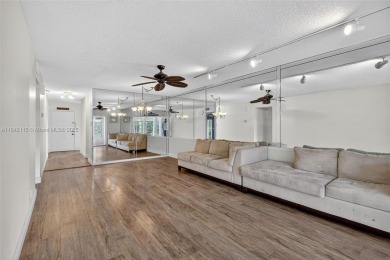 Wonderful 1st floor corner unit with parking right in front for on Villa Del Ray Golf Club in Florida - for sale on GolfHomes.com, golf home, golf lot