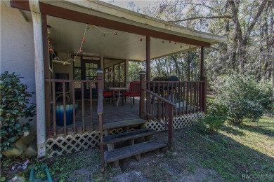 This beautifully remodeled home in Rainbow Springs Country Club on Rainbow Springs Golf and Country Club in Florida - for sale on GolfHomes.com, golf home, golf lot