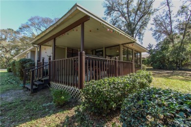 This beautifully remodeled home in Rainbow Springs Country Club on Rainbow Springs Golf and Country Club in Florida - for sale on GolfHomes.com, golf home, golf lot